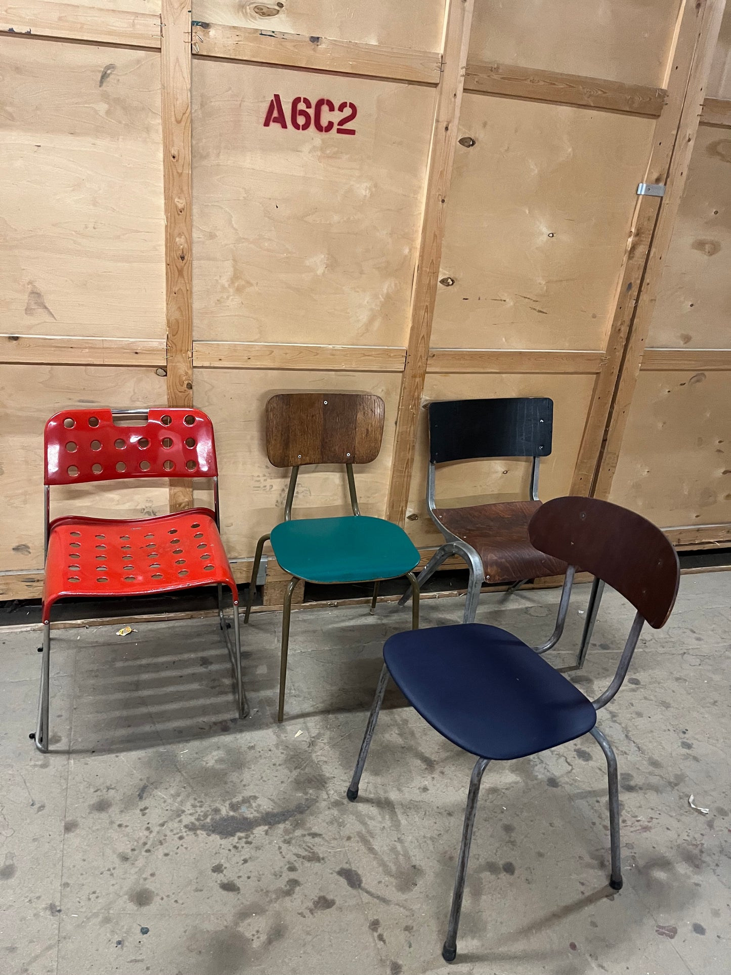 Mismatched set of midcentury stacking chairs OMK / Esavian /Danish