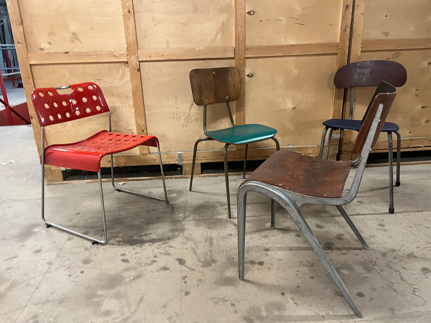 Mismatched set of midcentury stacking chairs OMK / Esavian /Danish