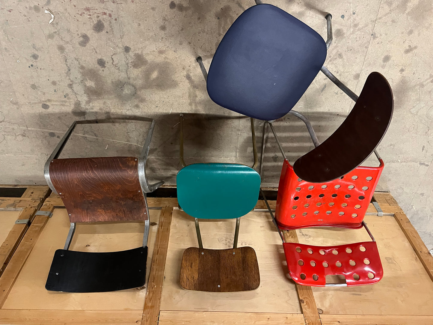 Mismatched set of midcentury stacking chairs OMK / Esavian /Danish