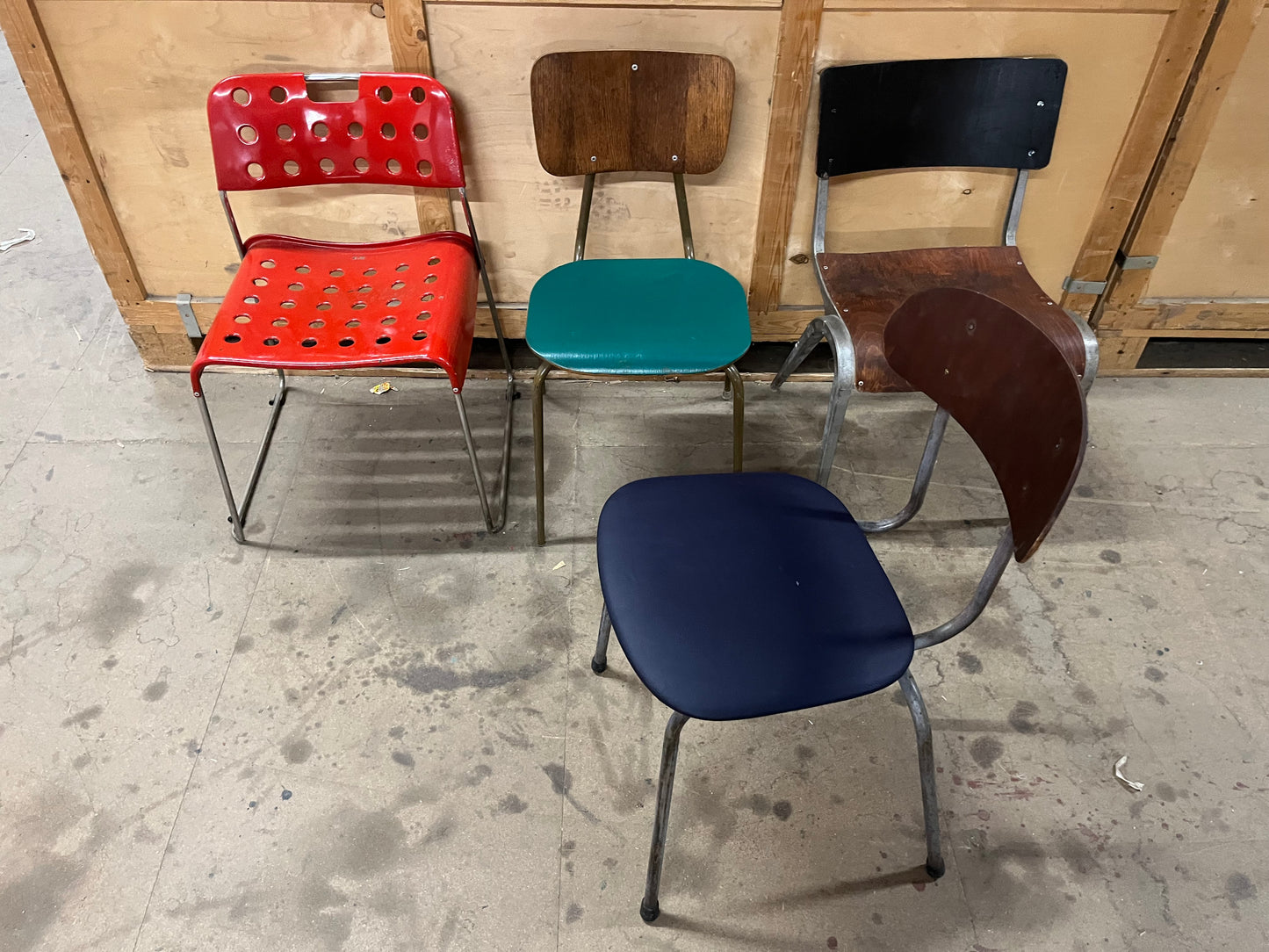 Mismatched set of midcentury stacking chairs OMK / Esavian /Danish