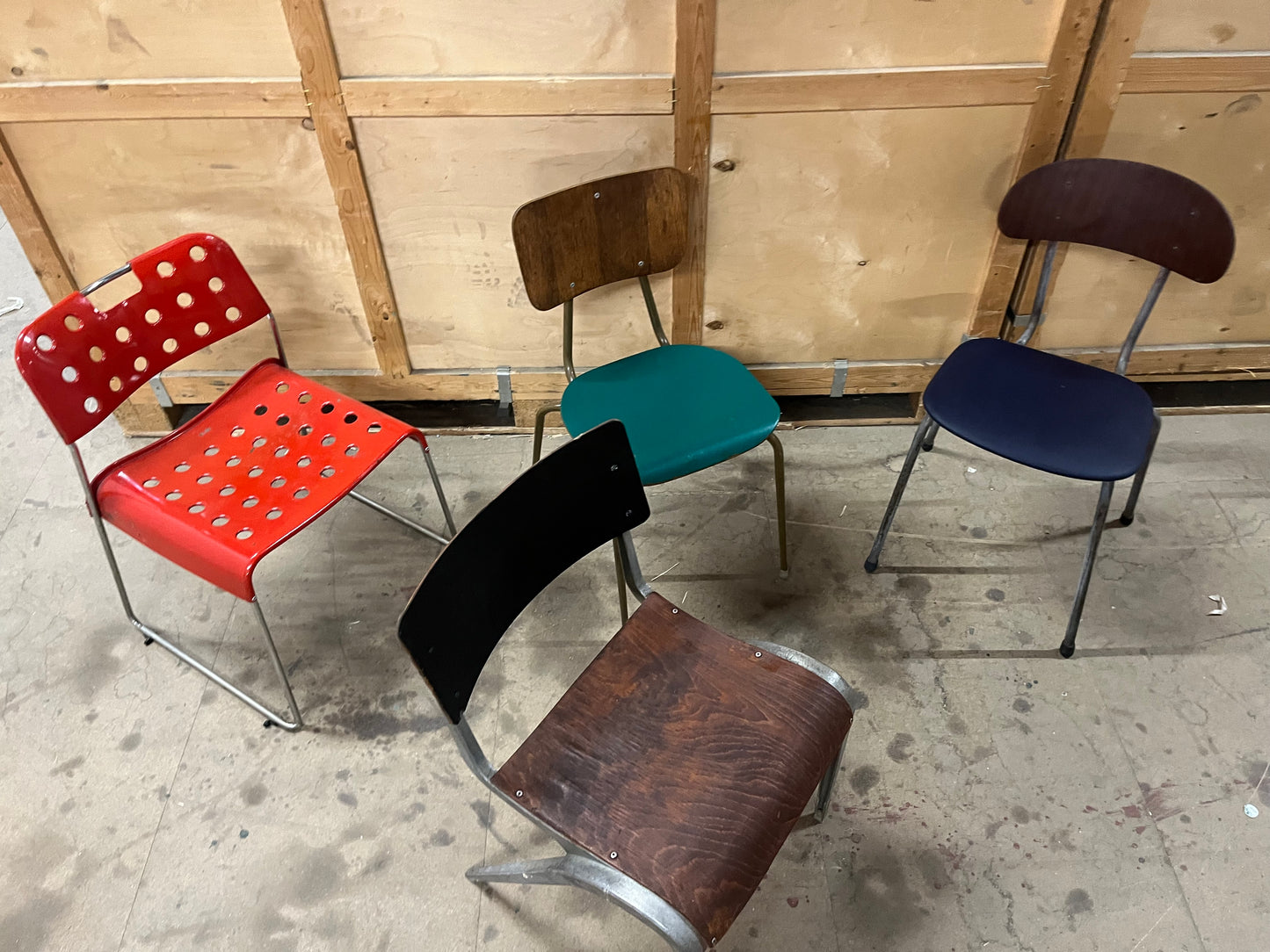 Mismatched set of midcentury stacking chairs OMK / Esavian /Danish