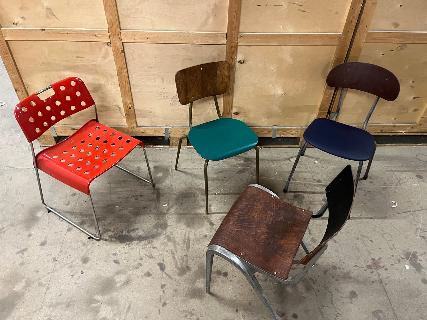 Mismatched set of midcentury stacking chairs OMK / Esavian /Danish