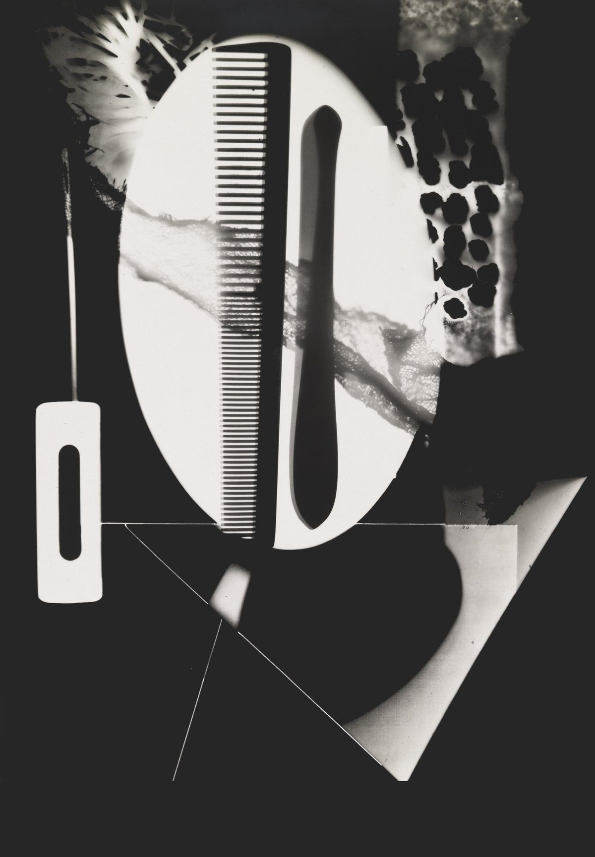 A dark comb crosses a glowing oval among fine threads, textured fragments and angular pale shapes.