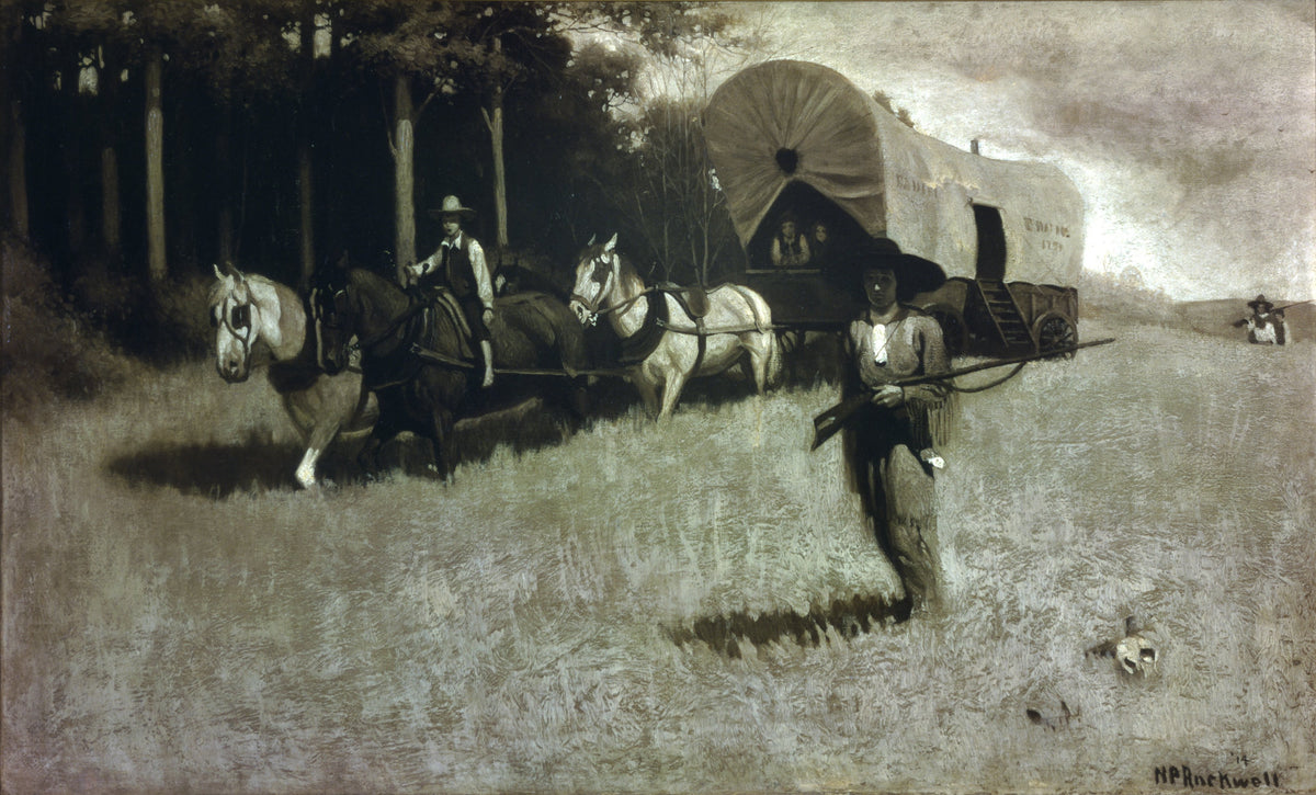 A scout carrying a long gun walks ahead of horses and a covered wagon at the edge of a wooded landscape.