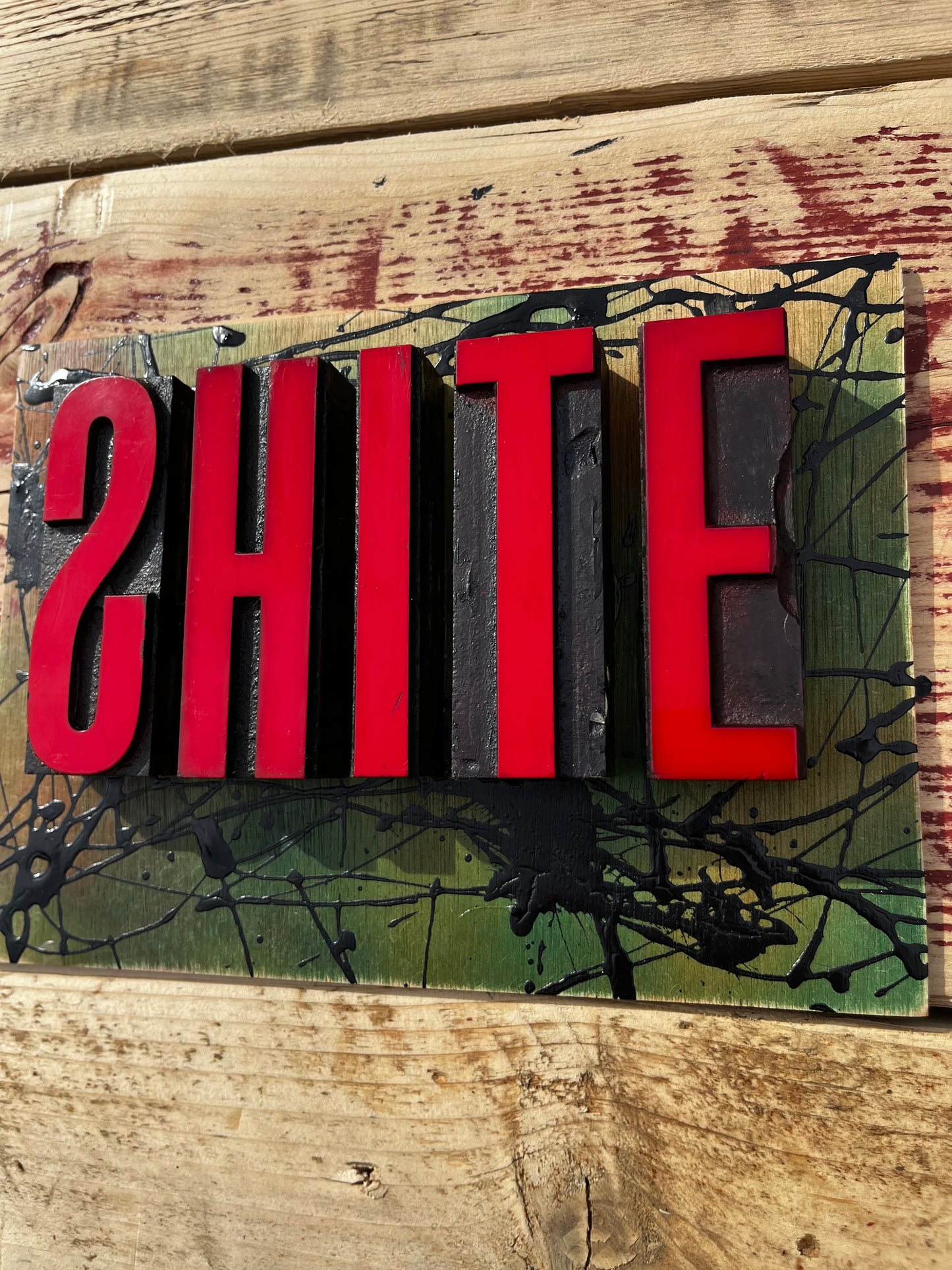 “Shite” artwork from reclaimed Printing blocks