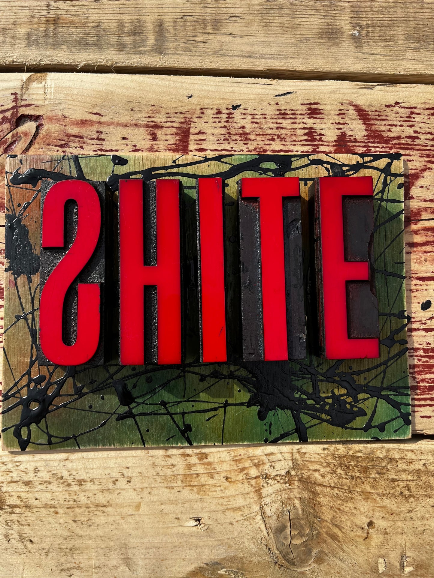 “Shite” artwork from reclaimed Printing blocks