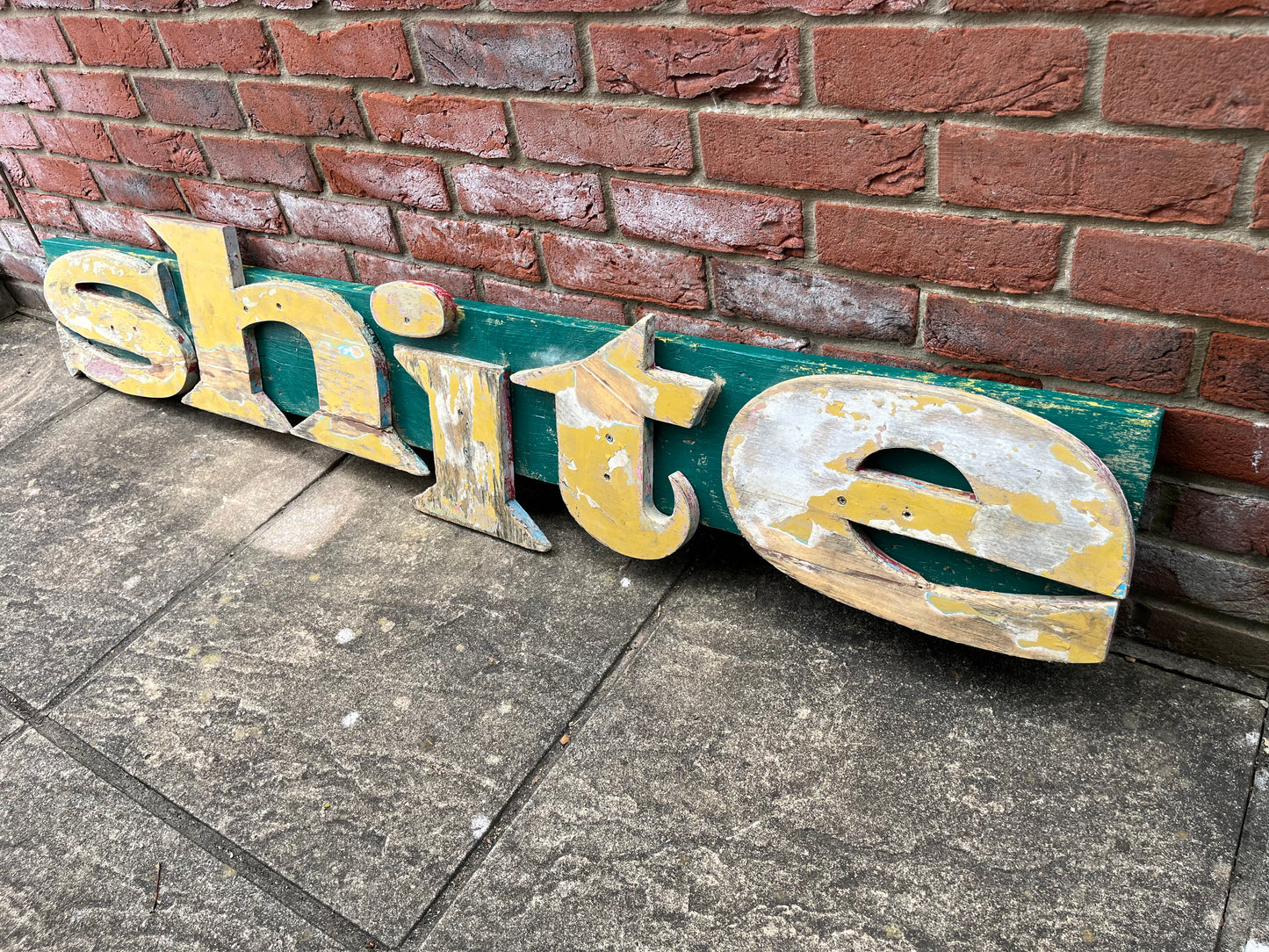 “Shite” reclaimed shop lettering custom signage