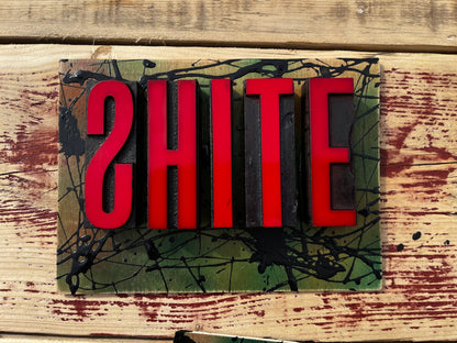 “Shite” artwork from reclaimed Printing blocks