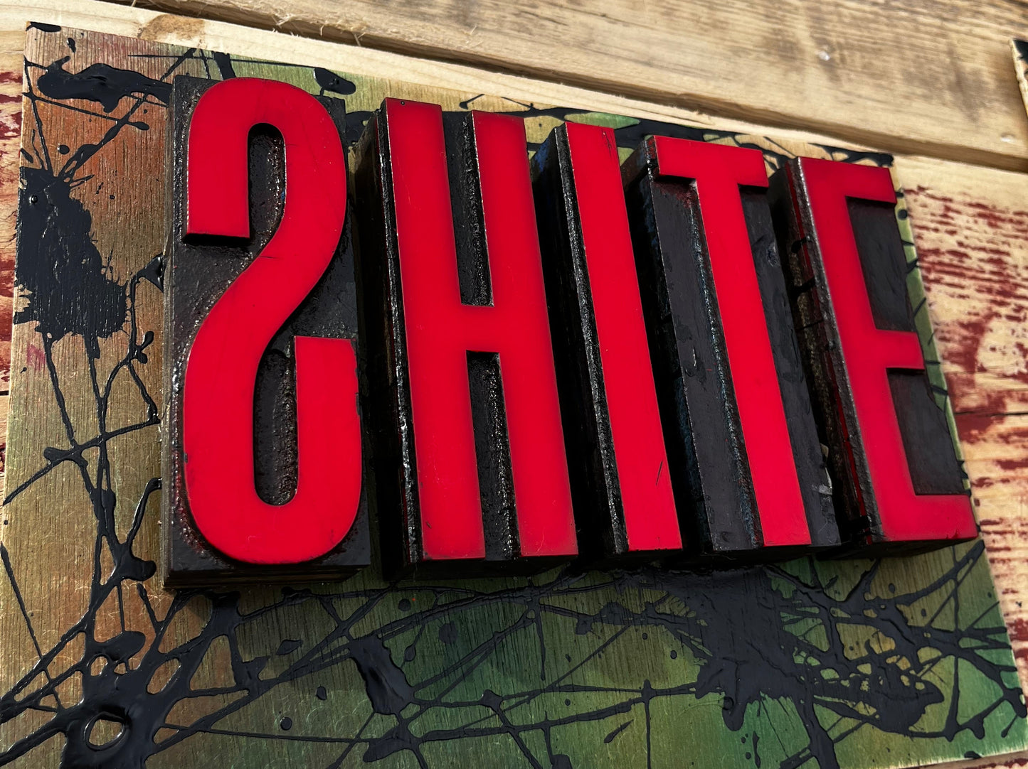 “Shite” artwork from reclaimed Printing blocks