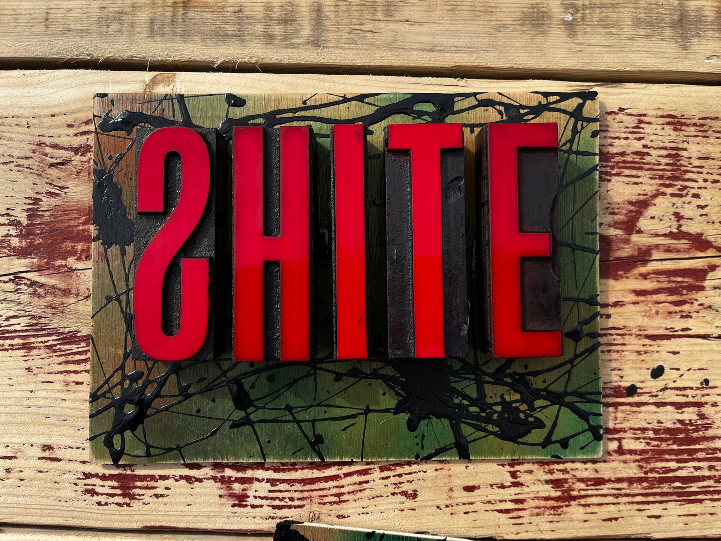 “Shite” artwork from reclaimed Printing blocks
