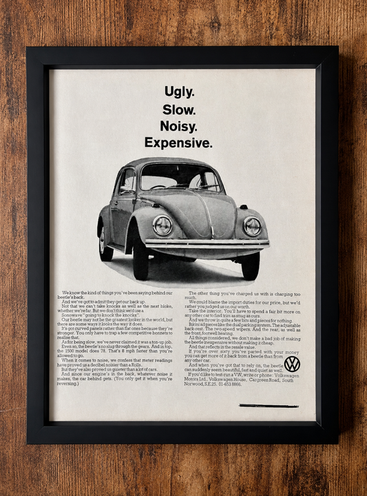 Vintage VW Volkswagen Beetle advertisement. 1968 Ugly, slow, noisy, Expensive