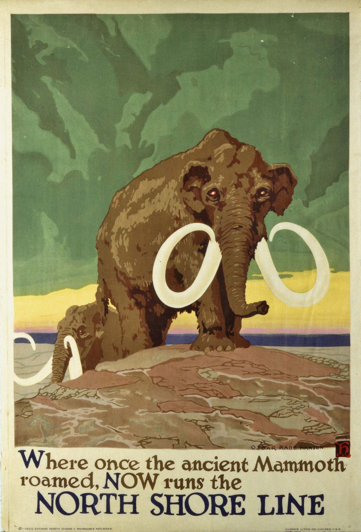 A woolly mammoth with sweeping white tusks stands against a green landscape above North Shore Line railway lettering.