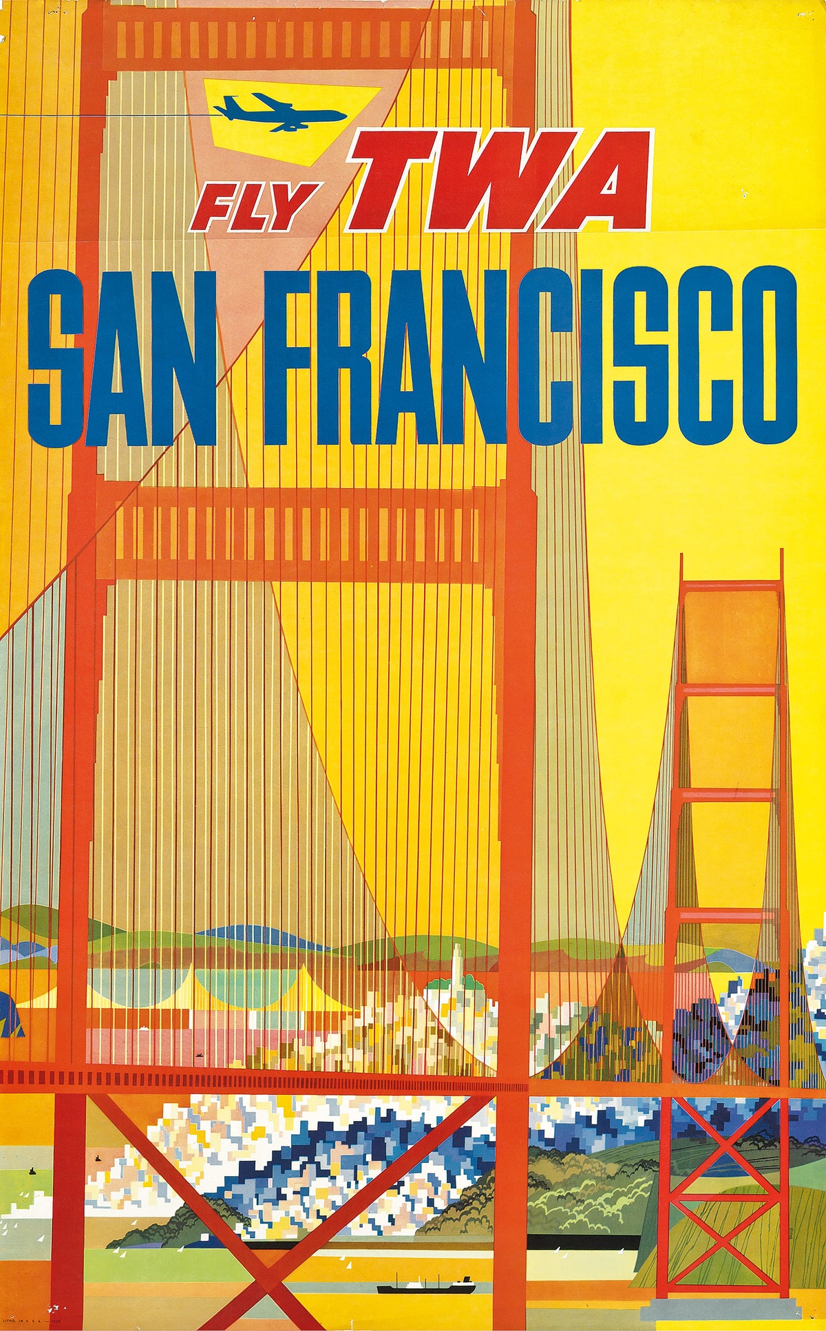 The red towers and cables of the Golden Gate Bridge frame San Francisco against a vivid yellow sky.