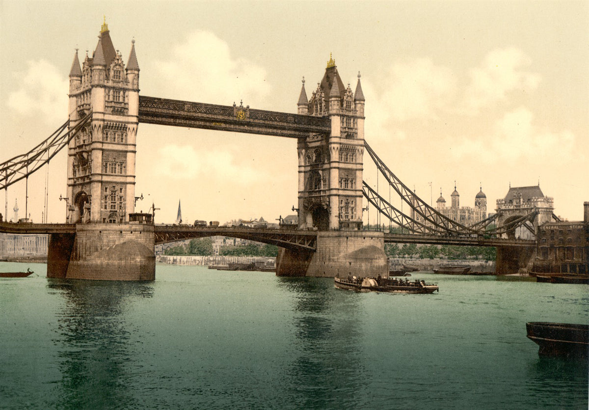Boats travel along the Thames below the stone towers and suspended walkways of Tower Bridge in muted cream and blue-green tones.
