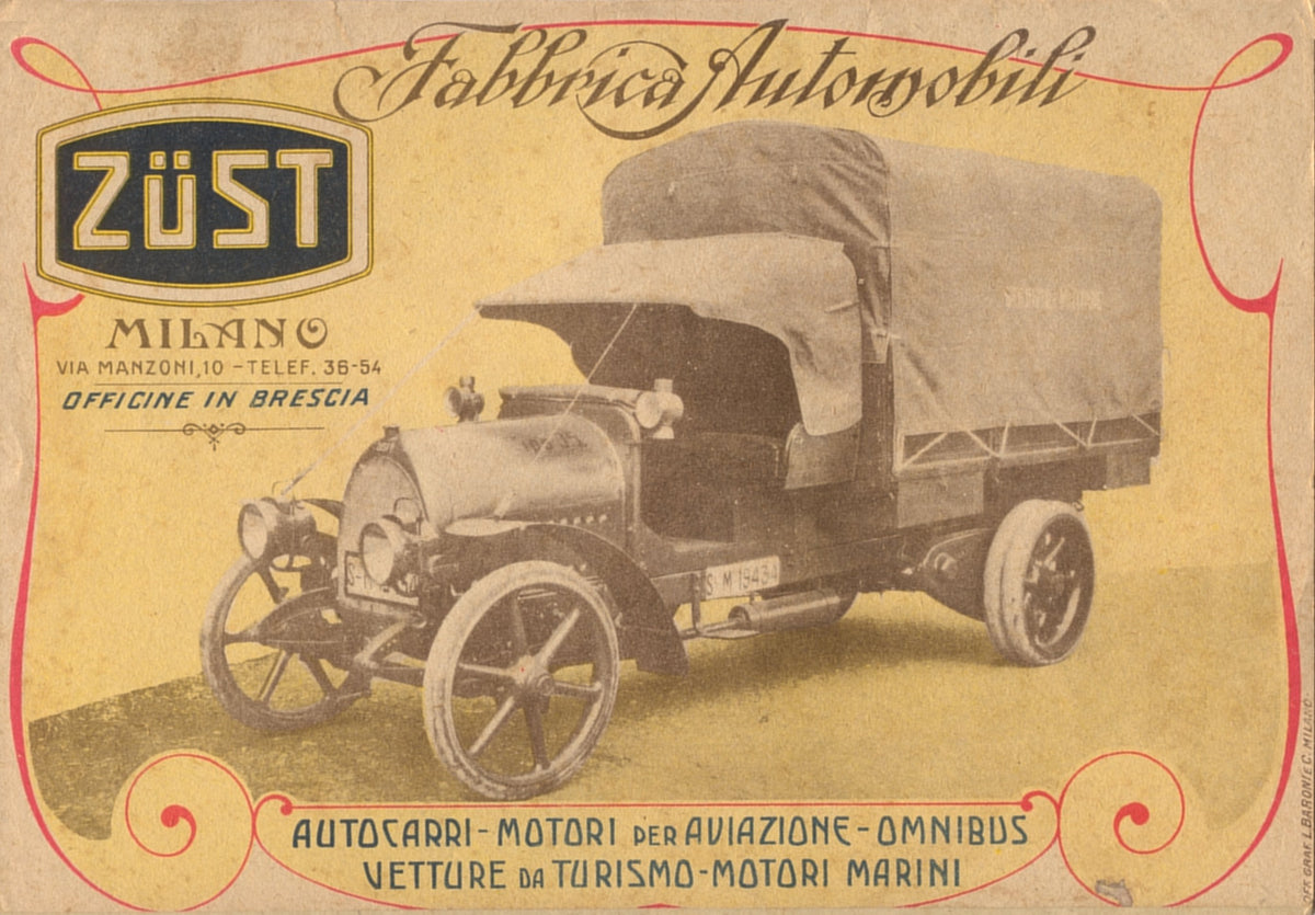 An early covered lorry takes centre stage in this warm-toned Italian automotive advertisement with decorative red borders.